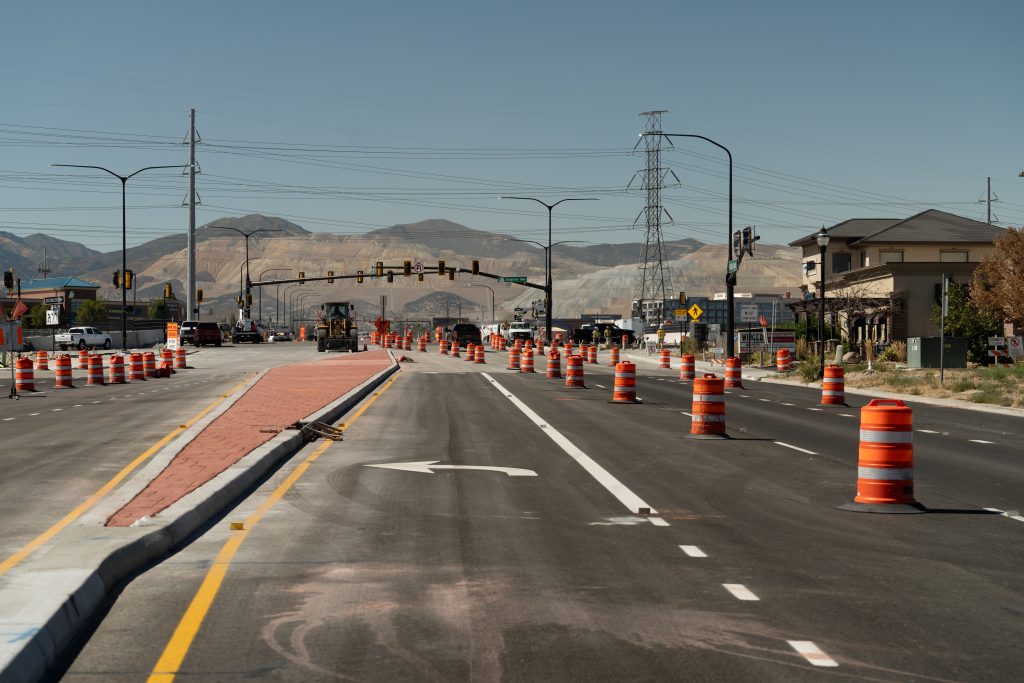 Intersection with traffic barrels during construction at Bangerter and 13400 South
