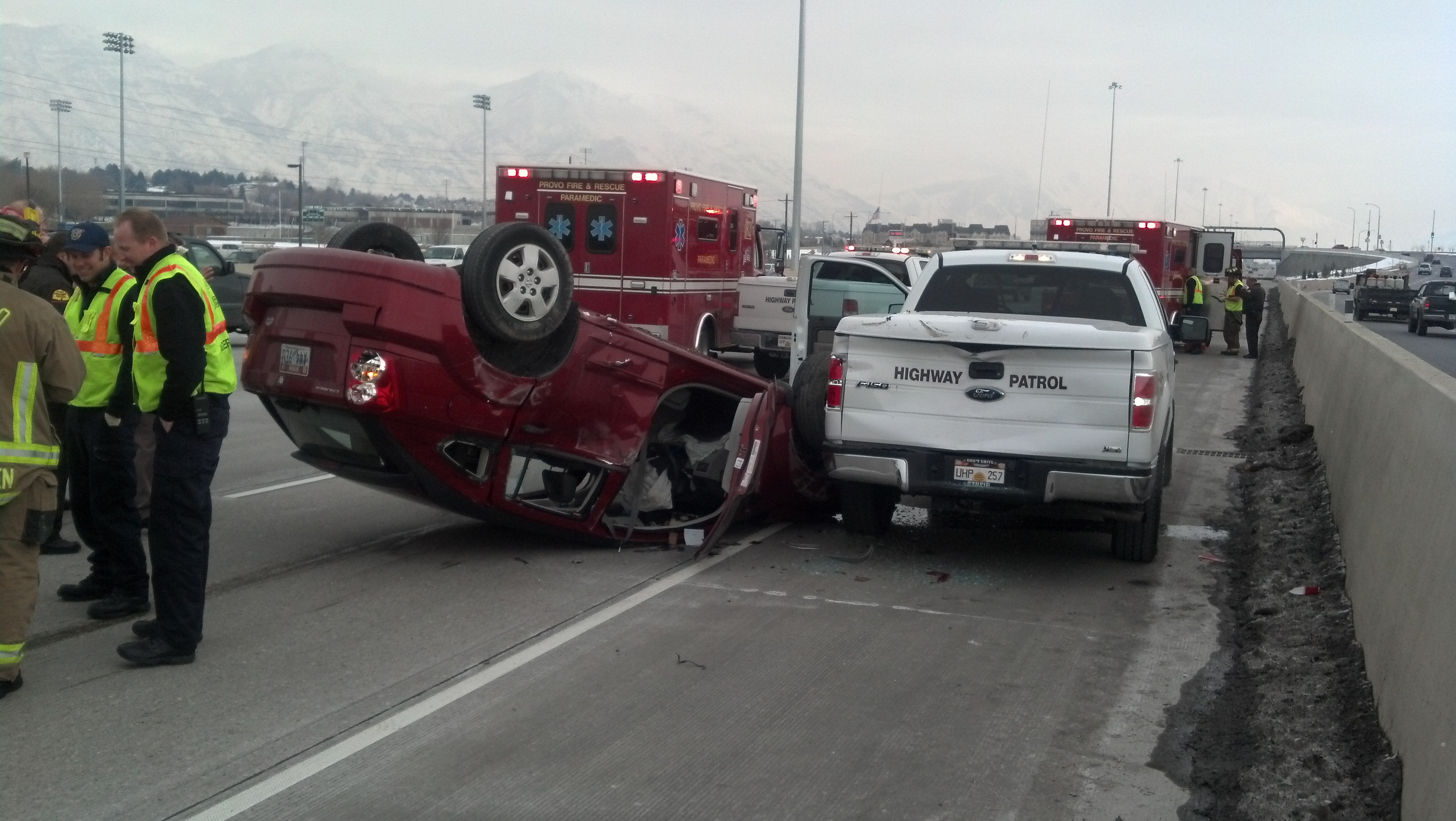 The shoulder of the road is dangerous and can be deadly. Photo shows a car that flipped upside down after striking a UHP vehicle on the shoulder.