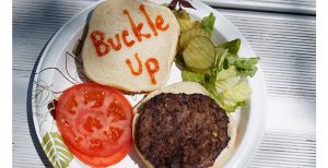 Hamburger with Buckle Up written in ketchup