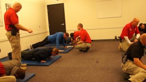 Candidates for UHP perform push ups