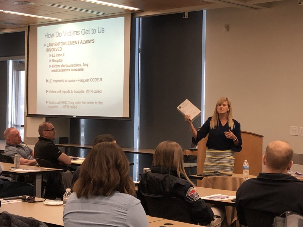 Trish Crump, RN, SANE-A holds up a kit used during a SANE exam at the sex crimes investigators' training