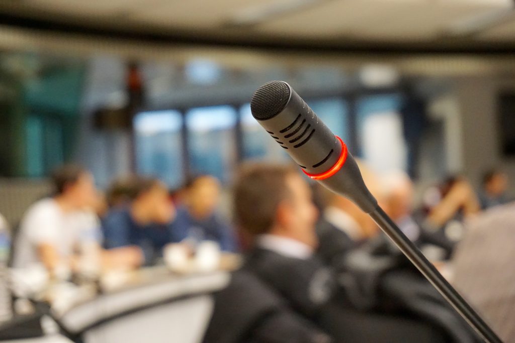 image of a microphone ready to receive public comment.