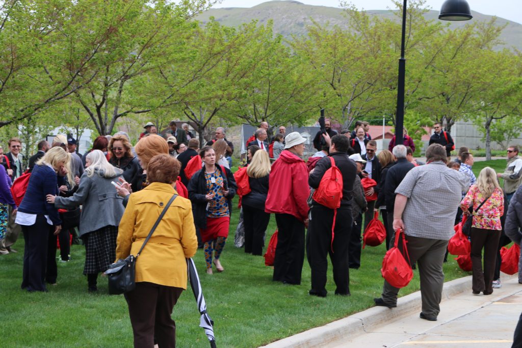 people evacuate from a building during an emergency drill